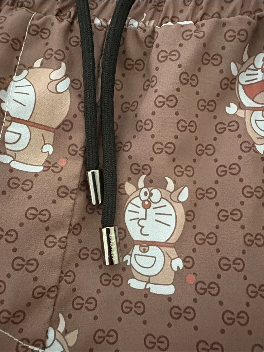 Gucci Brown Cartoon Logo Swim Trunks